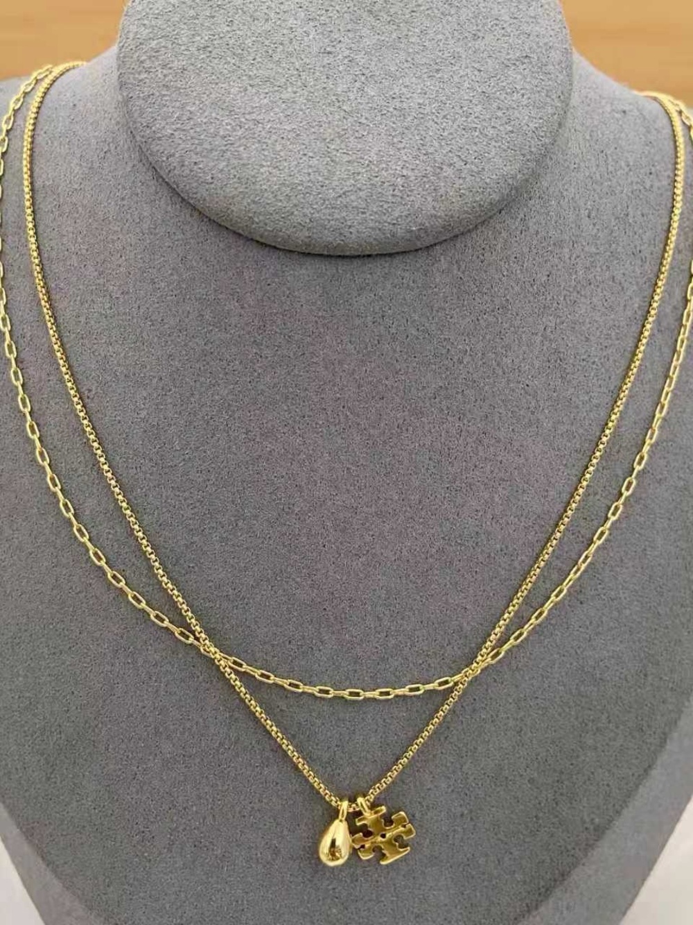 Tory Burch Gold Layered Necklace with Clover and Teardrop Charms